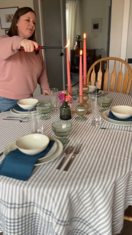 Spring tablescape with glass candlesticks and dinner plates from Be Home at The Container Store. 