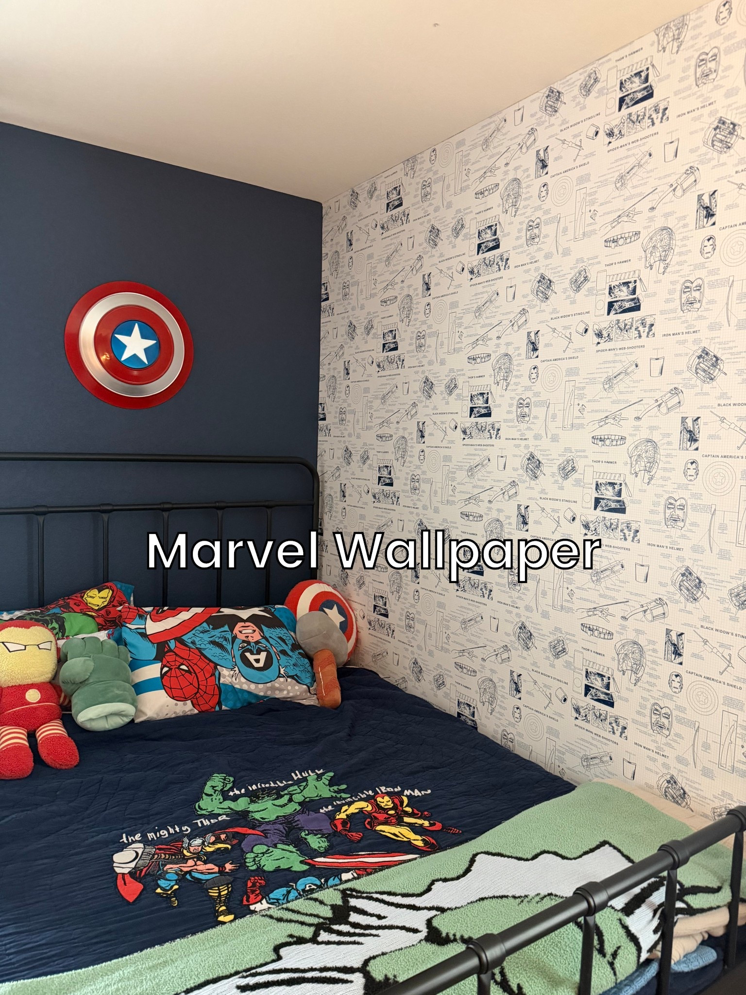 The best wallpaper for superhero loving little boys. This York wallpaper from Wayfair truly brought the room together. It has Marvel superhero blue prints, and the dark blue color really pops against the navy and reds in the rest of the room!!!

#LTKmomlife #LTKKids #LTKHome