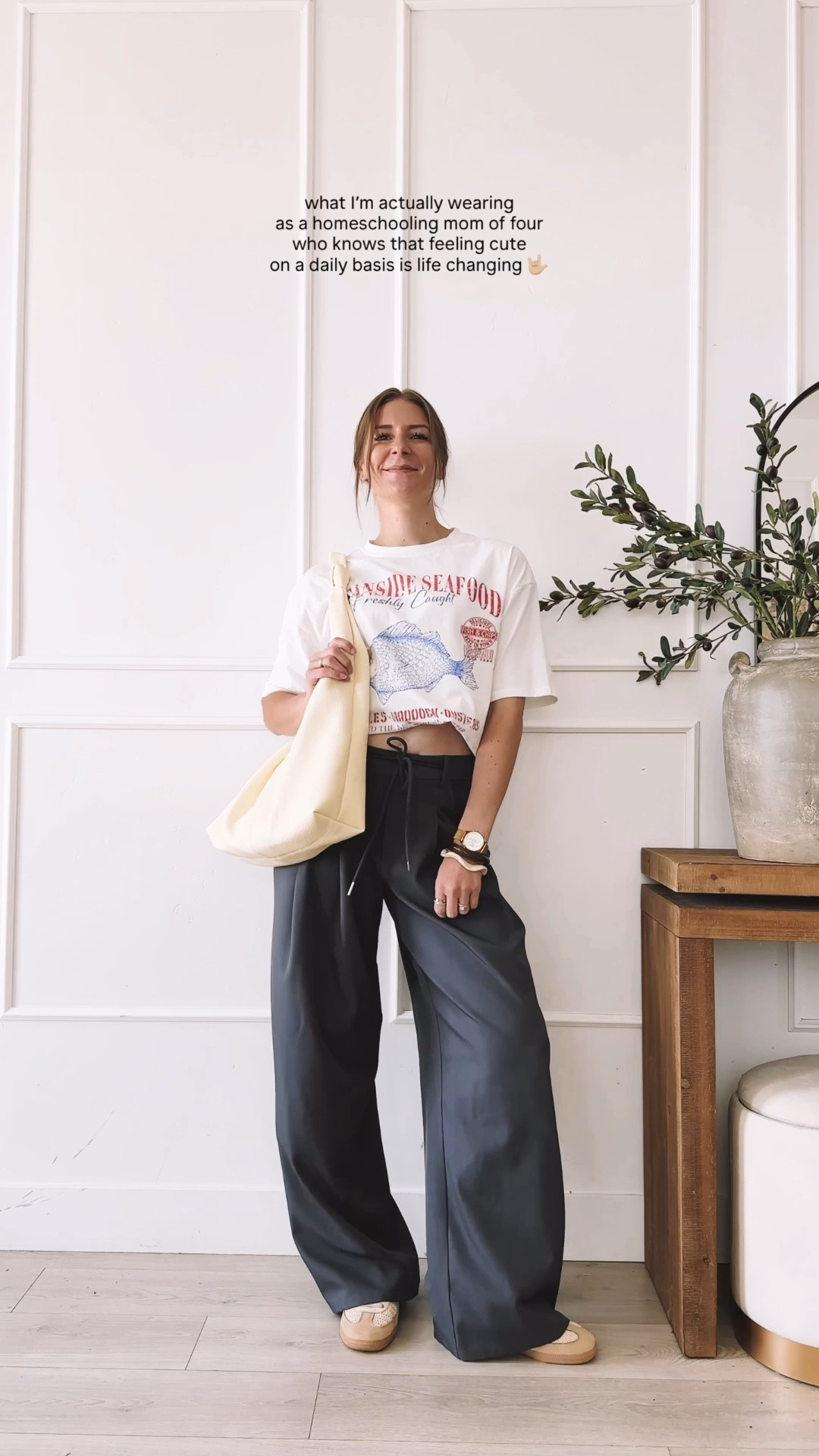 What a homeschooling mom of four actually wears on a daily basis. This graphic tee paired with wide leg pants, sneakers, and a canvas tote is the effortless everyday outfit that proves feeling cute on a daily basis is genuinely life changing. Everything is linked and shoppable below!

#LTKootd #LTKmomlife #LTKgrwm