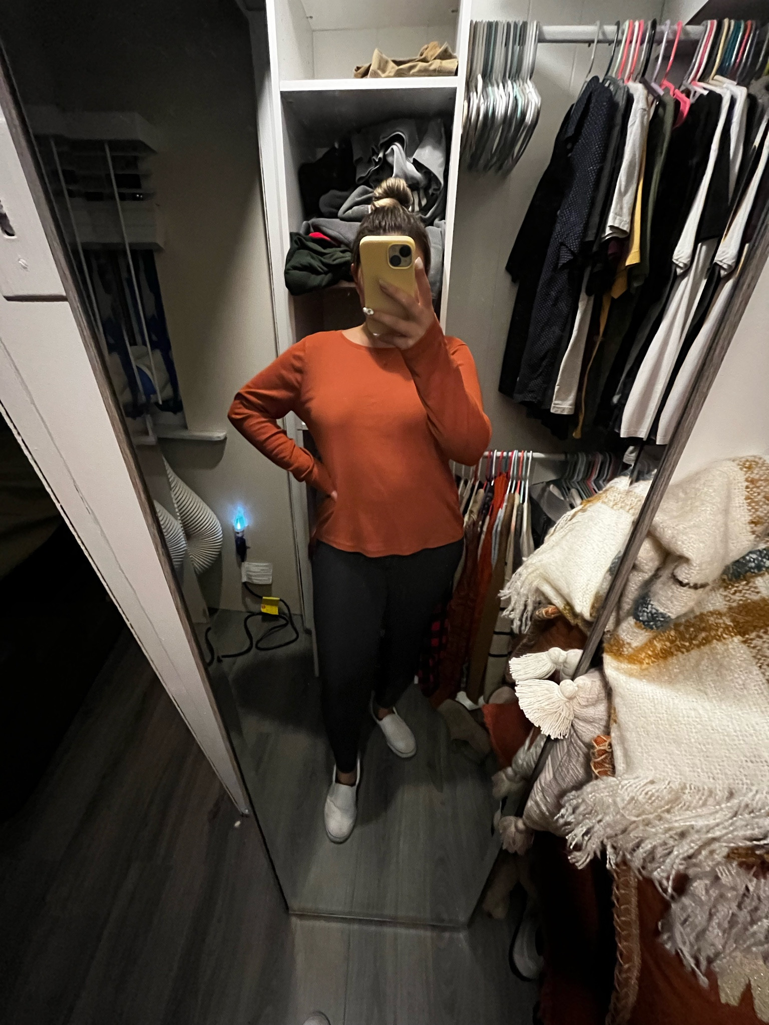 Leggings | rust colored long sleeve | messy bun kinda Friday 

#LTKshoecrush #LTKworkwear #LTKfindsunder50