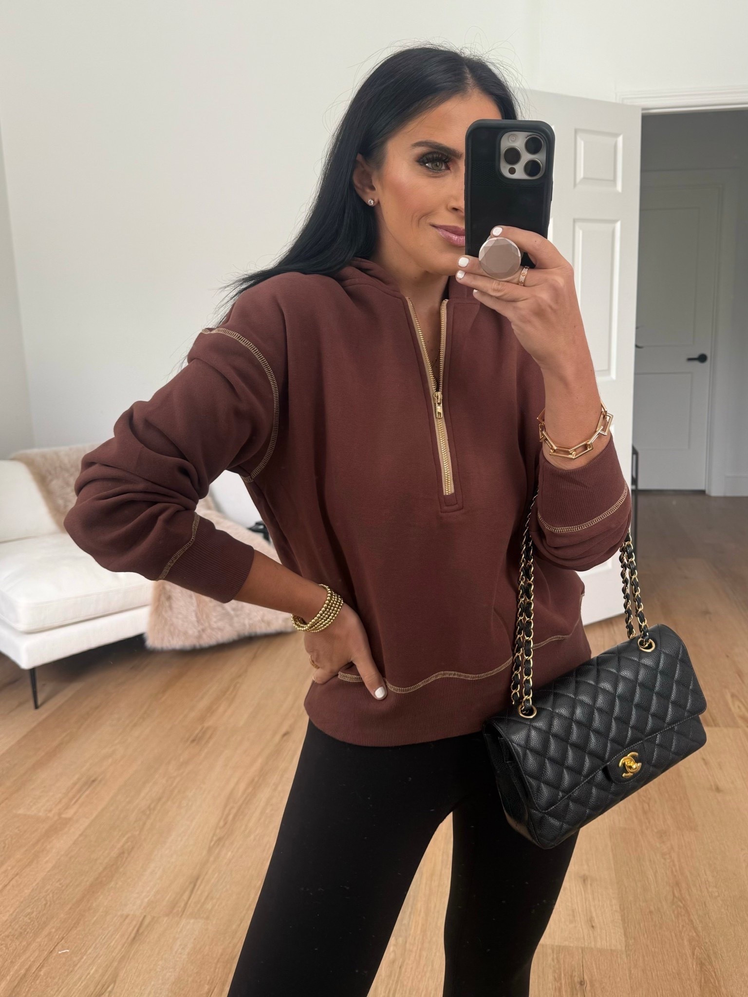 Amazon brown long sleeve half zip hoodie wearing size medium. Comes in a bunch of colors and is similar to Lululemon scuba zip