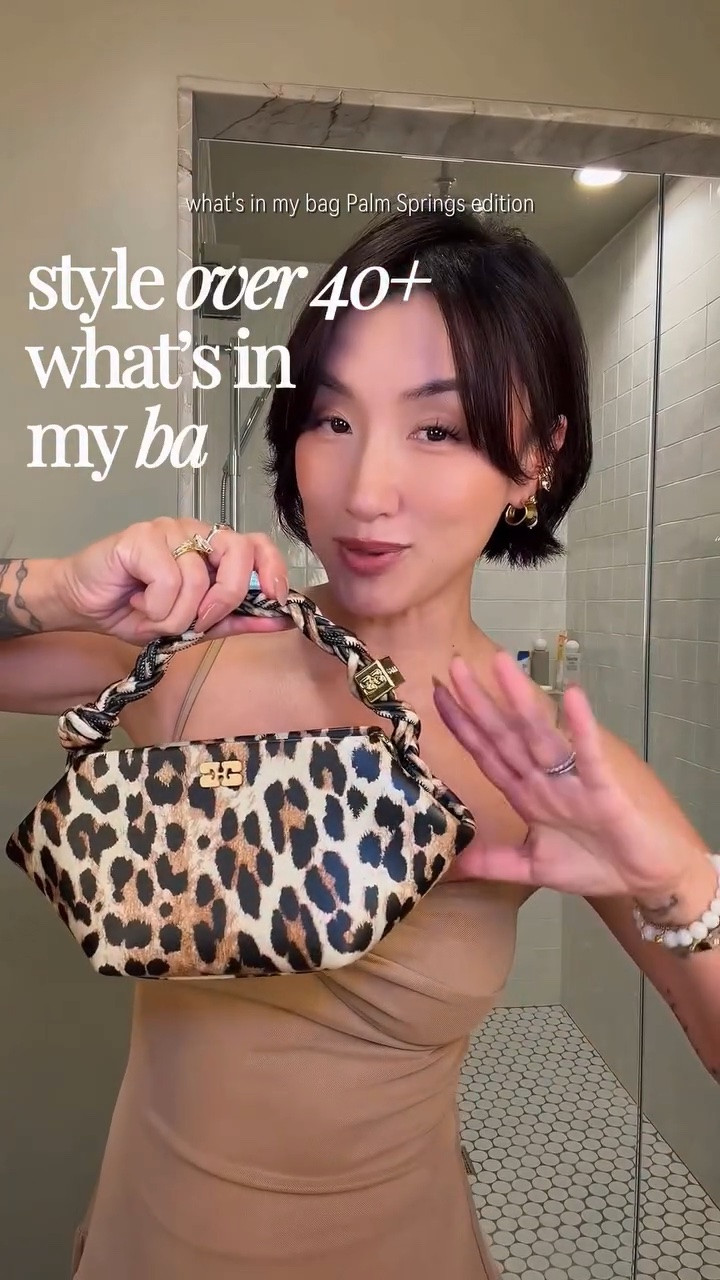 **Style over 40 – What’s In My Bag | Palm Springs Edition ☀️🌴👜**

Currently in Palm Springs and, of course, heading out to dinner in a cute outfit is a must ✨ But just as important? The bag—and everything I manage to fit inside it 😌

Today’s choice is this mini bag from Ganni 🤍 Proof that even a small bag can carry the essentials when you pack strategically. From beauty touch-ups to those little “just in case” items, there are a few things I never leave behind.

Other than your phone and wallet, what’s one thing that’s always in your bag? 👀💕

And if you’re curious about everything I packed into this mini bag, comment **”Bag Check”** below and I’ll send you the details 👜✨

#StyleOver40 #WhatsInMyBag #PalmSpringsStyle #BagEssentials #Over40Lifestyle