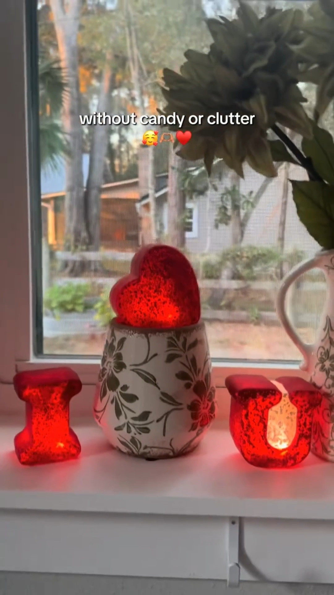 This illuminated “I ❤️ U” mercury glass set is such a sweet way to decorate for Valentine’s Day without going over the top. The soft glow instantly makes any space feel warm and cozy—perfect for a mantel, shelf, or entry table. It feels timeless (not cheesy), so it’s easy to bring out year after year. I especially love it styled with the Nearly Natural ceramic pots for a simple, layered look—I’ll link those separately so you can mix and match. Simple, charming decor that quietly says love without candy or clutter.

#valentinesdecor #seasonaldecor #cozyhome #homedecorideas 

#LTKHome #LTKHoliday #LTKFindsUnder50