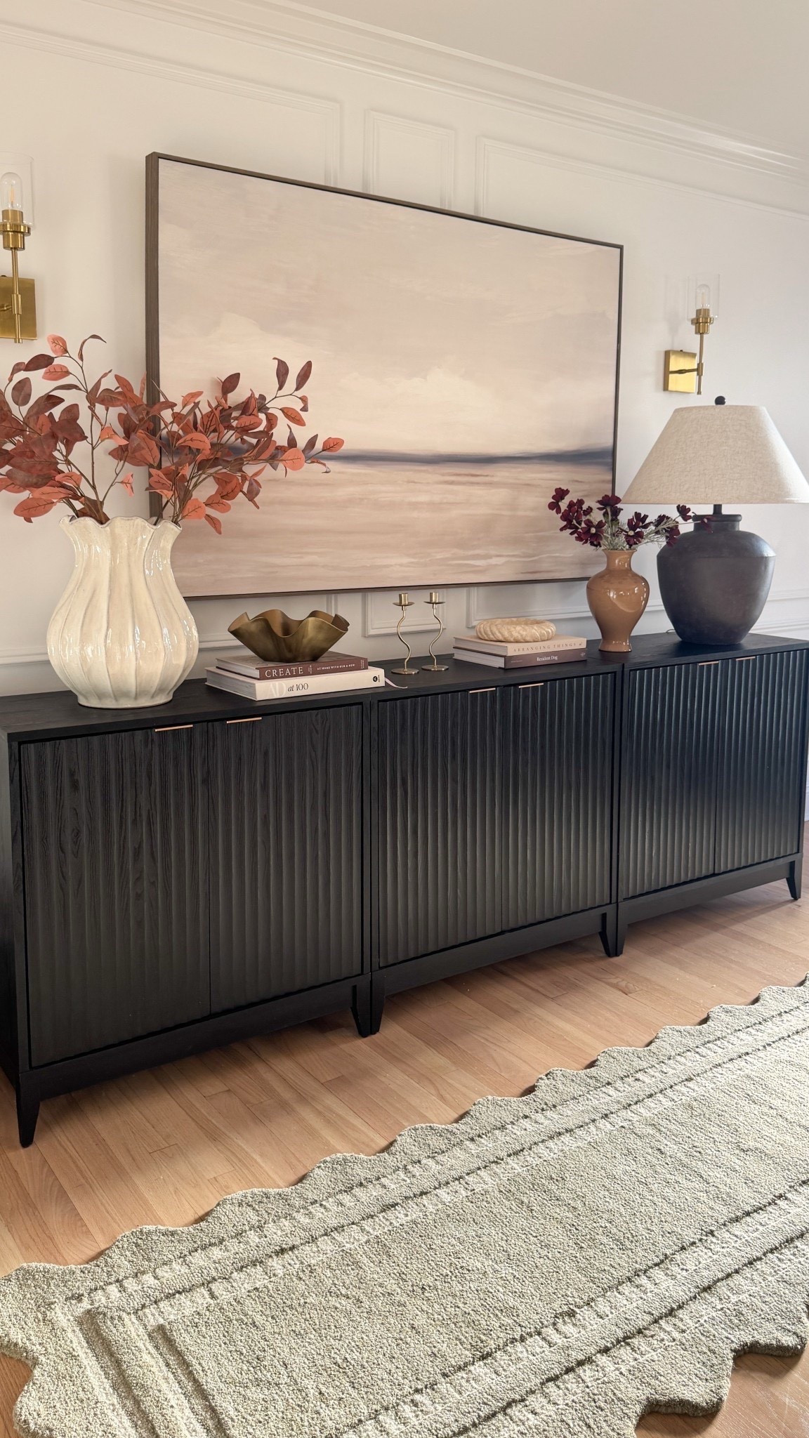 Elevated console styling that feels designer but still so affordable 🤎
This scalloped vase + faux stems combo is a Target find I keep coming back to—it instantly adds that warm, moody fall vibe to the whole setup. Paired with layered books, a statement lamp, and my favorite textured cabinet, it all ties together for a look that feels high-end without the price tag.


#TargetFinds #HomeInspo #EntrywayStyling #ConsoleTableDecor #LTKFinds

#LTKHome