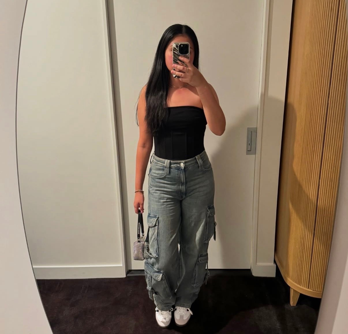 Corset with cargo jeans is my favorite combo. Mixing baggy with fitted. Cute outfit for a night out 

#LTKootd #LTKspring