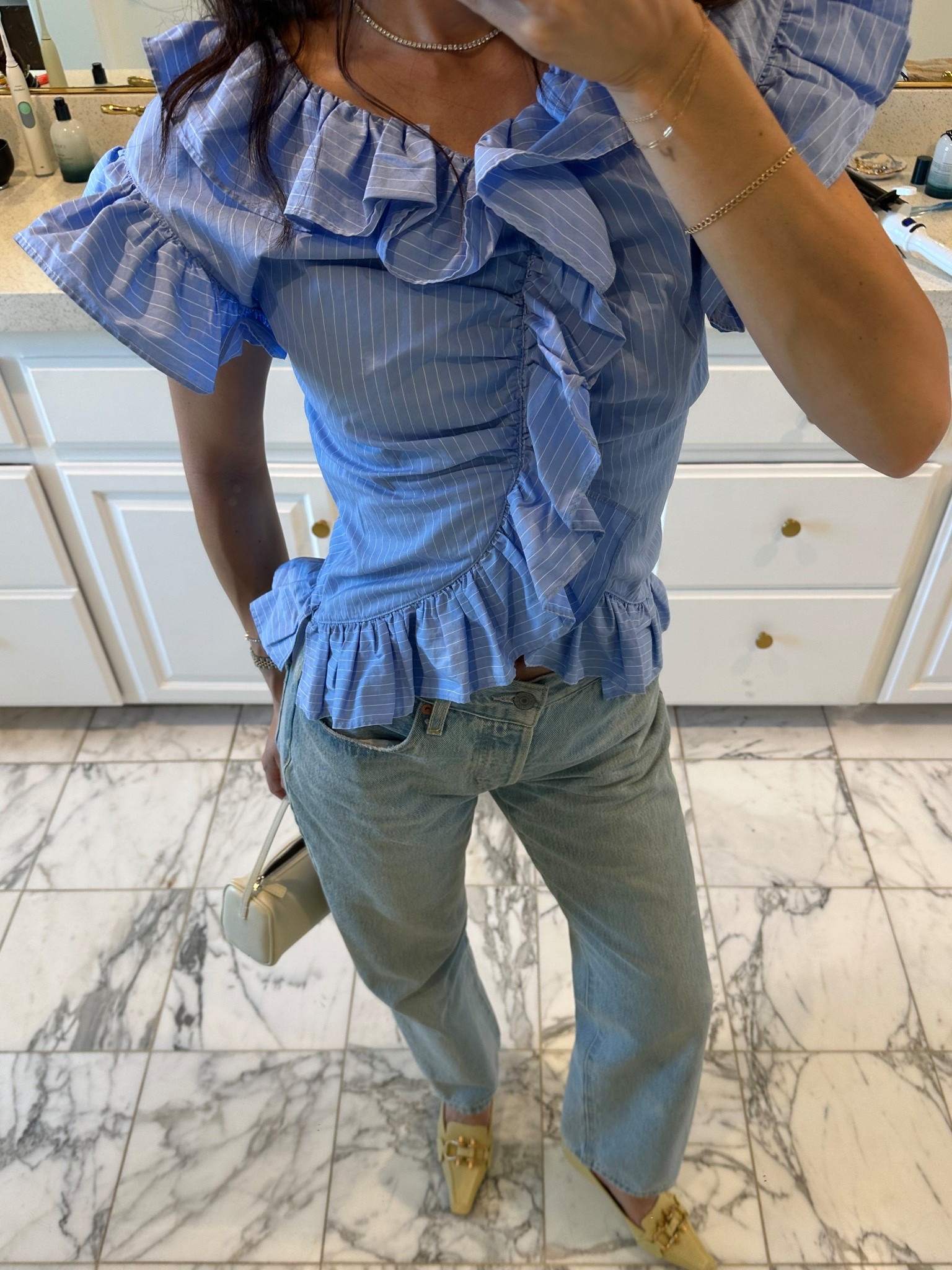 Wearing 2 in the shirt! Jeans are one of my go tos, they have a nice vintage fit. I can’t find this bag in cream to link so linking diff colorways! Shoes are Bottega off The Real Real.

#LTKStyleTip #LTKItBag #LTKFindsUnder100