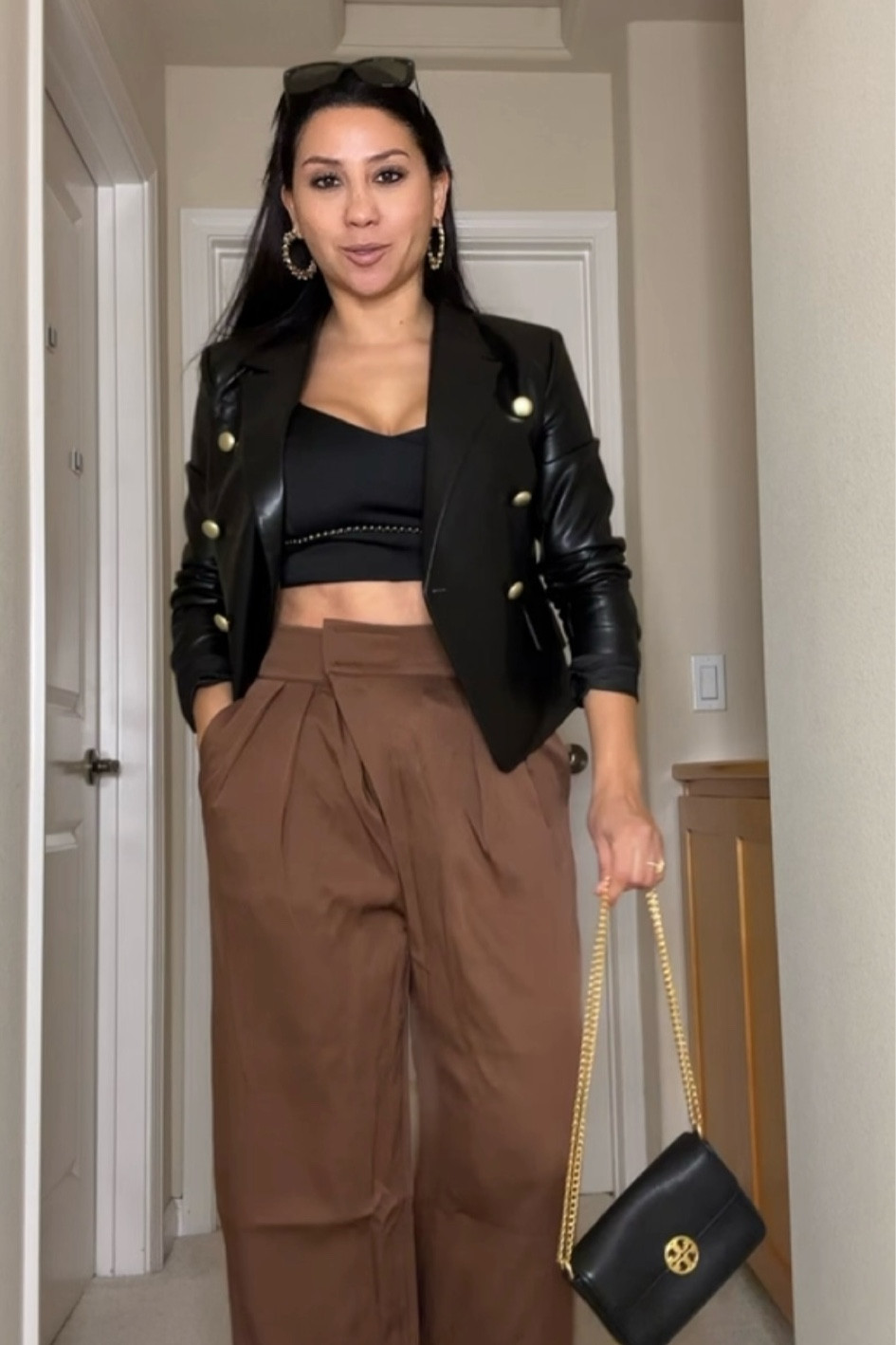Tory Burch bag, brown pants, faux leather jacket 

#LTKSaleAlert #LTKHoliday #LTKParties