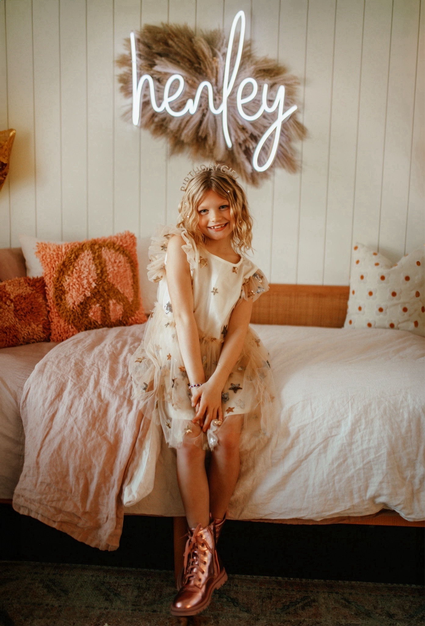 Working on getting Henley’s bedroom finished! Seeing lots of questions on her pampas/name light arrangement! Her neon name light is from Brite Lite Tribe! Her bed is from World Market & I also linked a similar one! Linked everything else here! 

Girls bedroom, girls room, rattan bed, neon light, pampas decor, pampas 