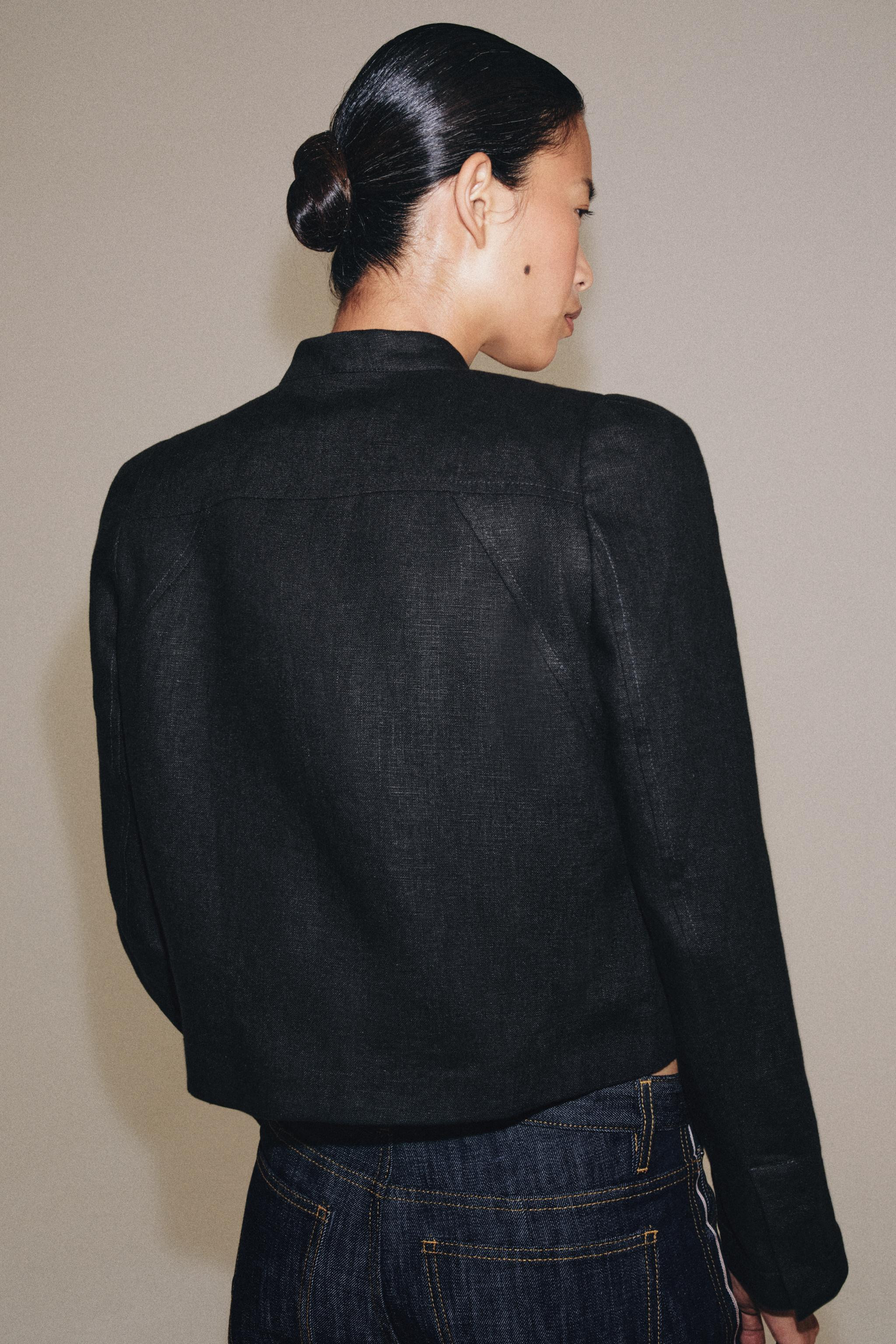 ZARA WOMAN COLLECTION. Jacket crafted from 100% linen fabric. Featuring a high neck and long slee... | Zara US