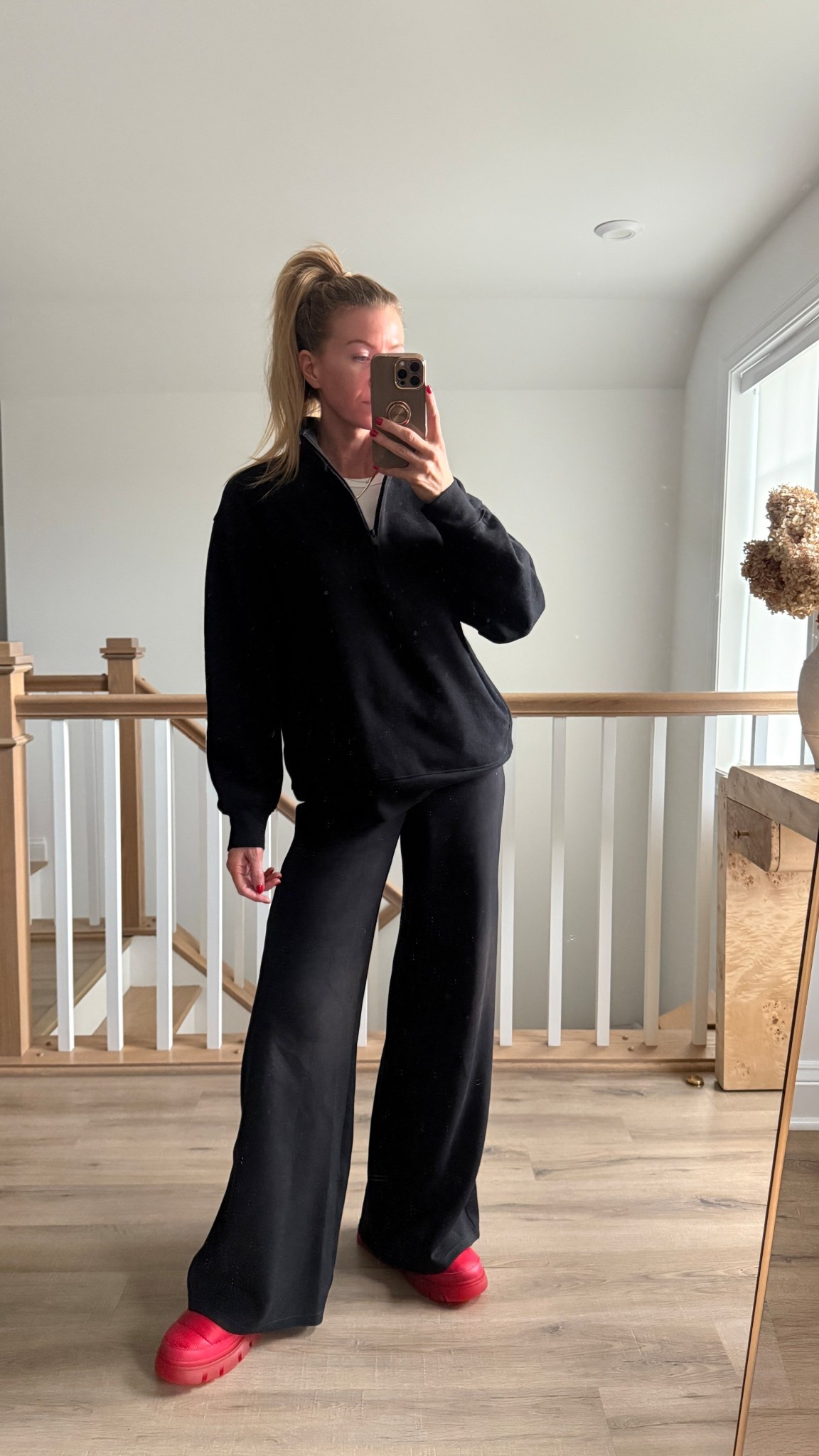 Black half zip sweatshirt: runs oversized, wearing a S
Black wide leg lounge pants: run slightly large, wearing a S
Red Hunter Mules: run small, order a full size up! 

#LTKSeasonal #LTKGiftGuide #LTKHoliday