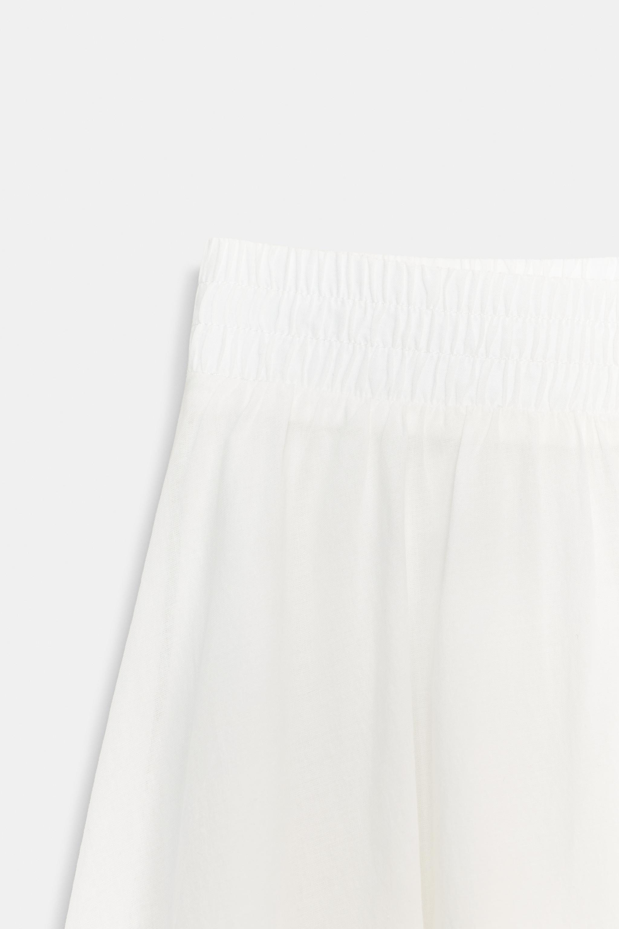 Midi skirt crafted from 100% cotton fabric. High-waist with an elasticated waistband. Tonal linin... | Zara UK