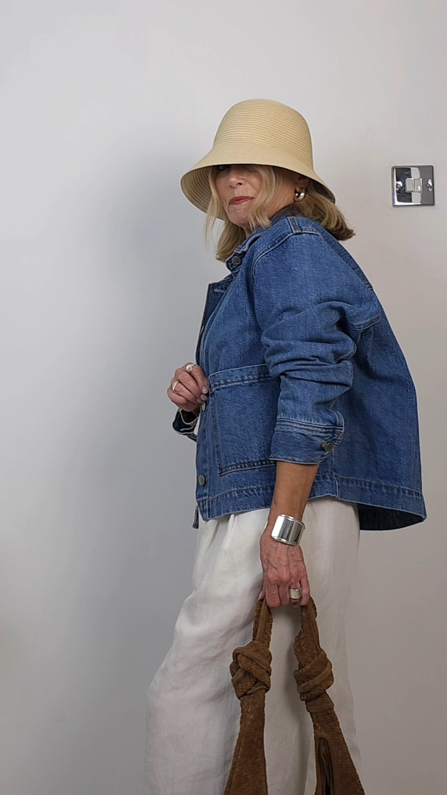 Easy spring outfit inspo - linen blend trousers - denim jacket- white t shirt- nude suede kitten heel toe post sandals - tan suede bag - straw hat

#LTKuk #LTKspring #LTKover50style
