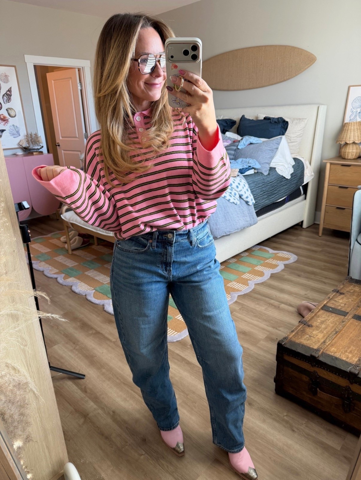 This might be my new favorite everyday combo 💗

A slightly oversized striped polo + perfectly broken-in straight leg denim = effortless but styled. The pink makes it feel fun and fresh, and the structured jeans keep it from looking too casual.

I love that this top gives cozy energy but still feels polished enough for lunch, errands, or casual Friday. And these jeans? The fit is chef’s kiss — high rise, flattering through the waist, and that classic straight leg that goes with everything.

Fit notes:
• Top runs relaxed (size down if between)
• Jeans are true to size with a great structured feel
• Such an easy tuck or half-tuck moment

Linking everything here 🤍 This is one of those outfits you’ll wear on repeat.