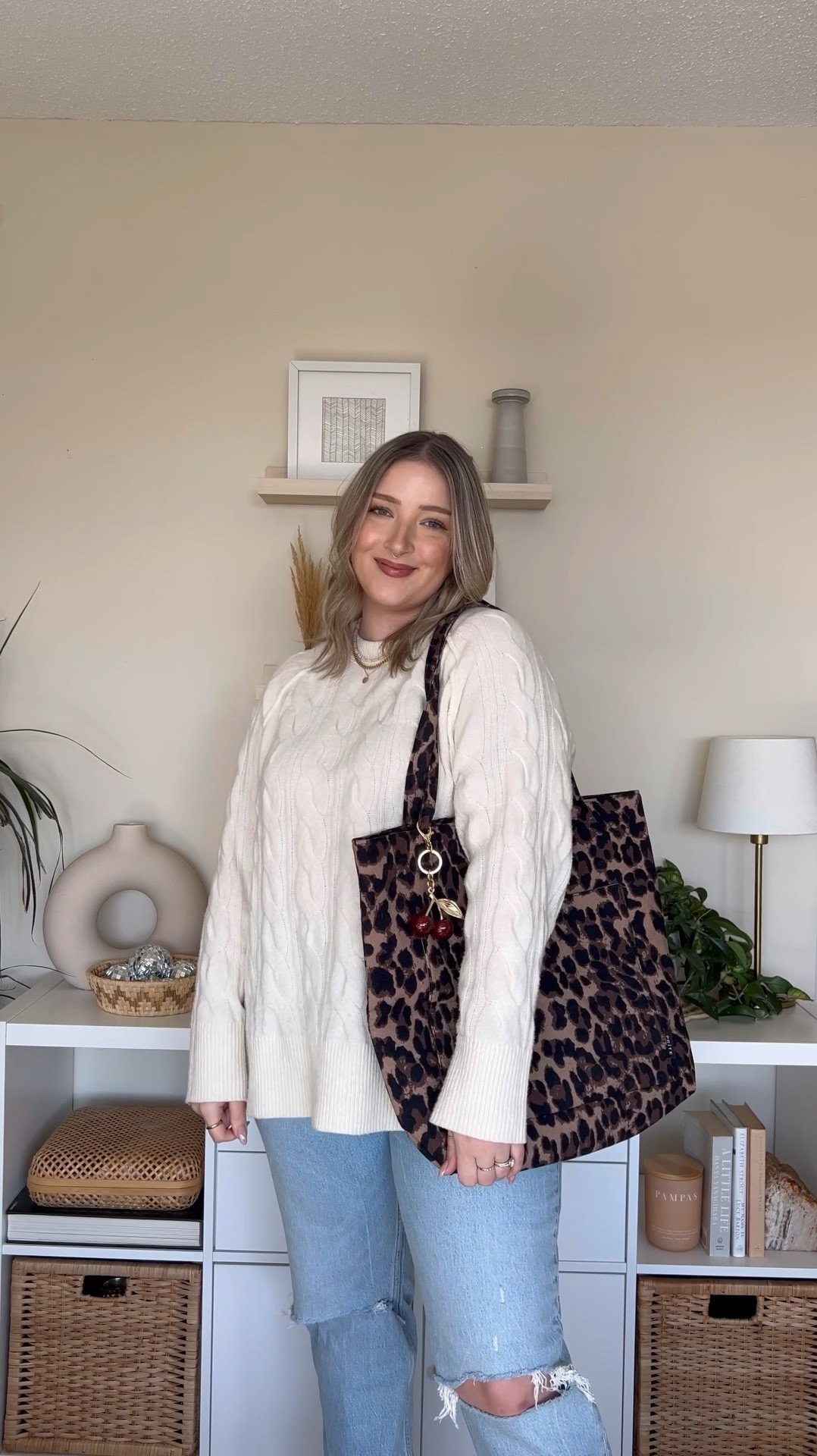 Amazon corduroy leopard tote bag - so roomy inside and has 2 inside pockets, a zip pocket, and an outside patch pocket with magnetic closure. Jeans and sweater both fit TTS - wearing size 32 & L. Also linked my cherry bag charm!Amazon fashion finds


#LTKstyletip #LTKmidsize #LTKbag
