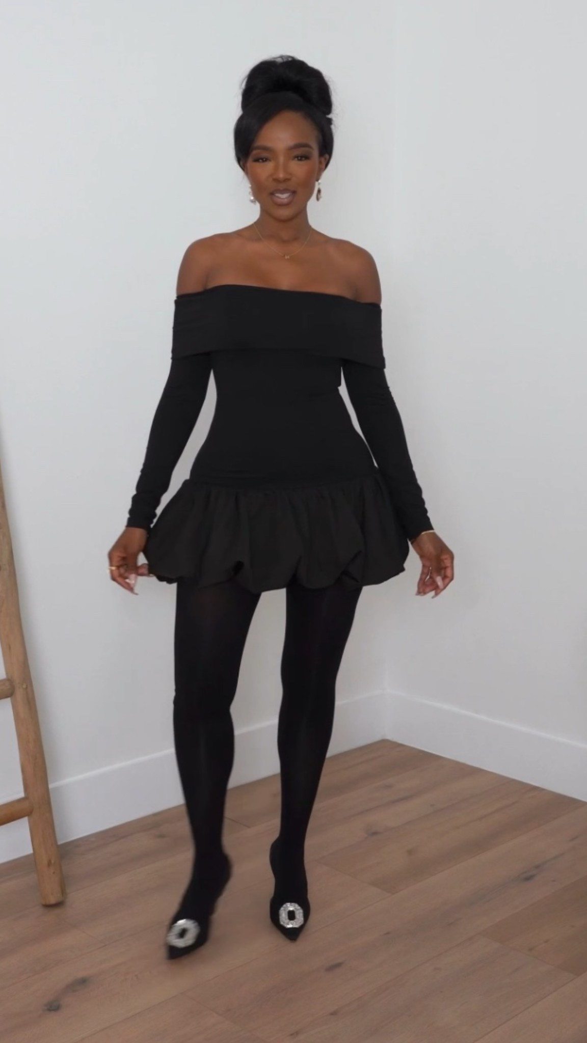 ✨ All-Black Holiday Glam  
An off-the-shoulder moment that feels flirty, chic, and so easy to style. The ruffled mini hem adds the perfect touch of drama while keeping the look sleek and modern for any festive night out.

Tap to get details.

Kira’s measurements: 5'4”, 138 lbs, 34D, 27" waist, 40" hips

All-black holiday outfit inspiration, chic winter party look, off-the-shoulder mini dress styling, elevated night-out fashion, classic black festive outfit ideas.

Follow me on Instagram and YouTube @kirasfashionfinds