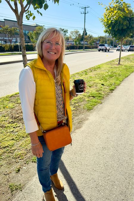 Are you looking for the perfect fall outfit? This is one of my favorite combinations! Jeans, neutral shirt, sweater vest, down vest, booties and a colorful crossbody bag. This out will take you from the pumpkin patch to the fire pit! 
Fall Outfits. 

#LTKtravel #LTKover40 #LTKSeasonal