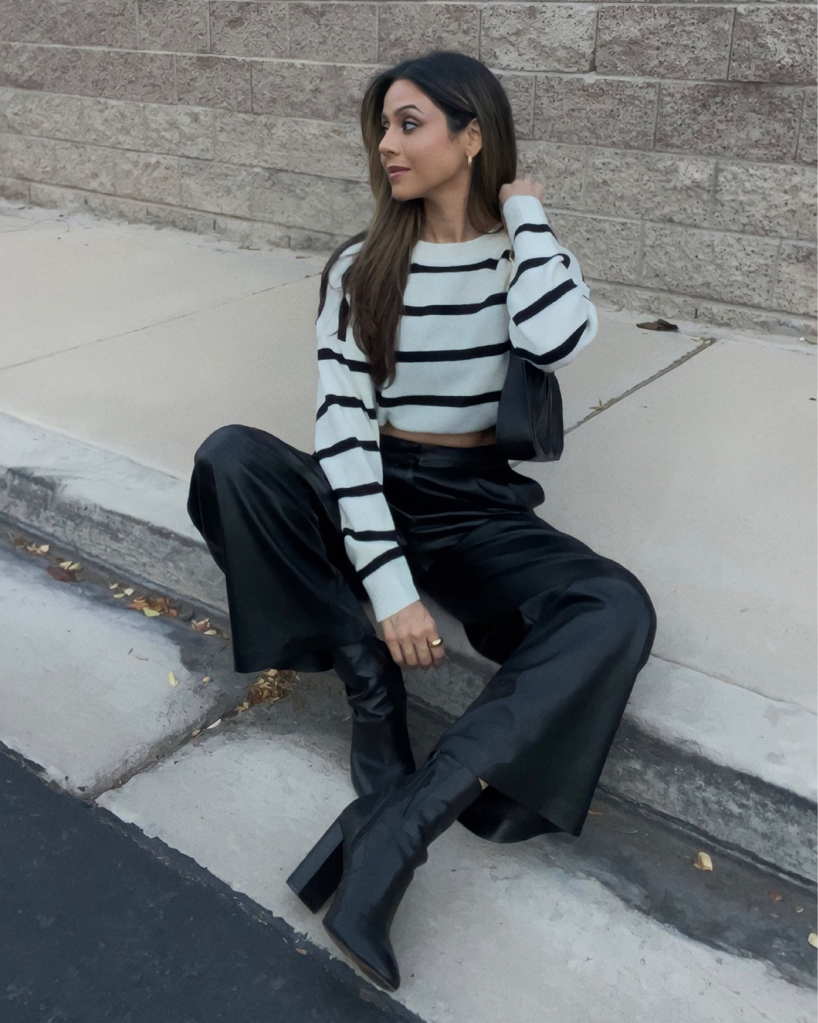 Black and white fall winter outfit wearing striped sweater, leather pants and black booties🖤 

#LTKsalealert #LTKstyletip #LTKGiftGuide