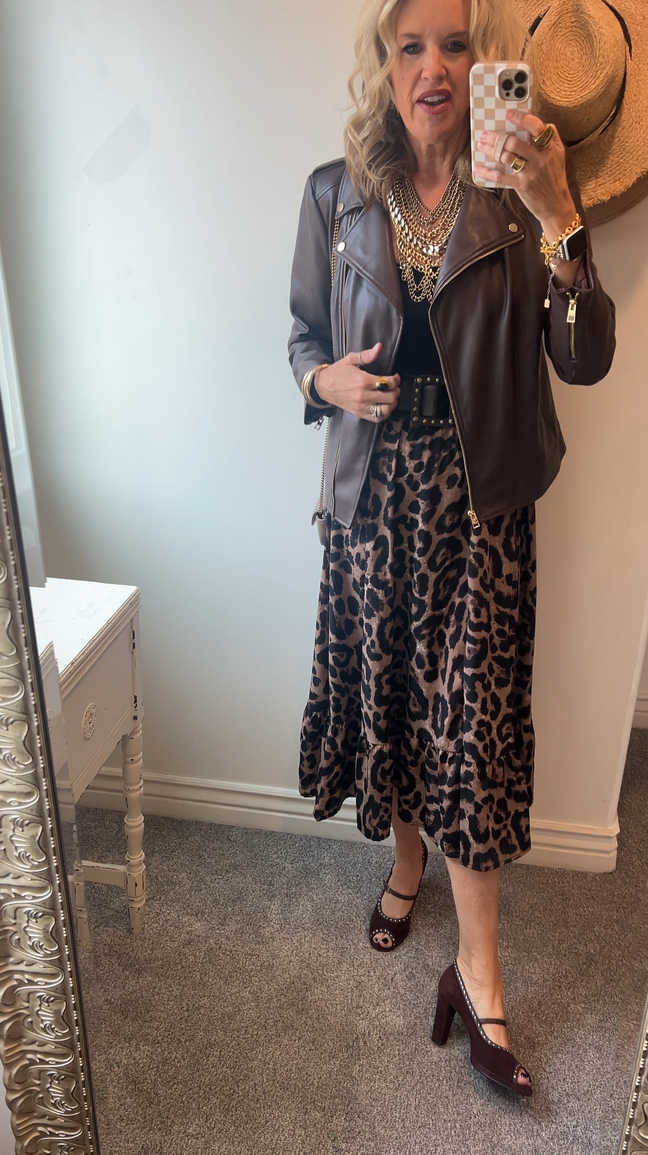 #ootd 
Way to wear leopard skirt

Amazon find leopard skirt fits tts

Black Pumiey bodysuit tts 

Chocolate faux leather jacket fits tts 

Vintage suede Mary Jane heels with side details 

Multi chain statement  necklace 

Wide chock belt with studs 

Julie Vos earring, bracelets and ring 

#LTKStyleTip #LTKFindsUnder50