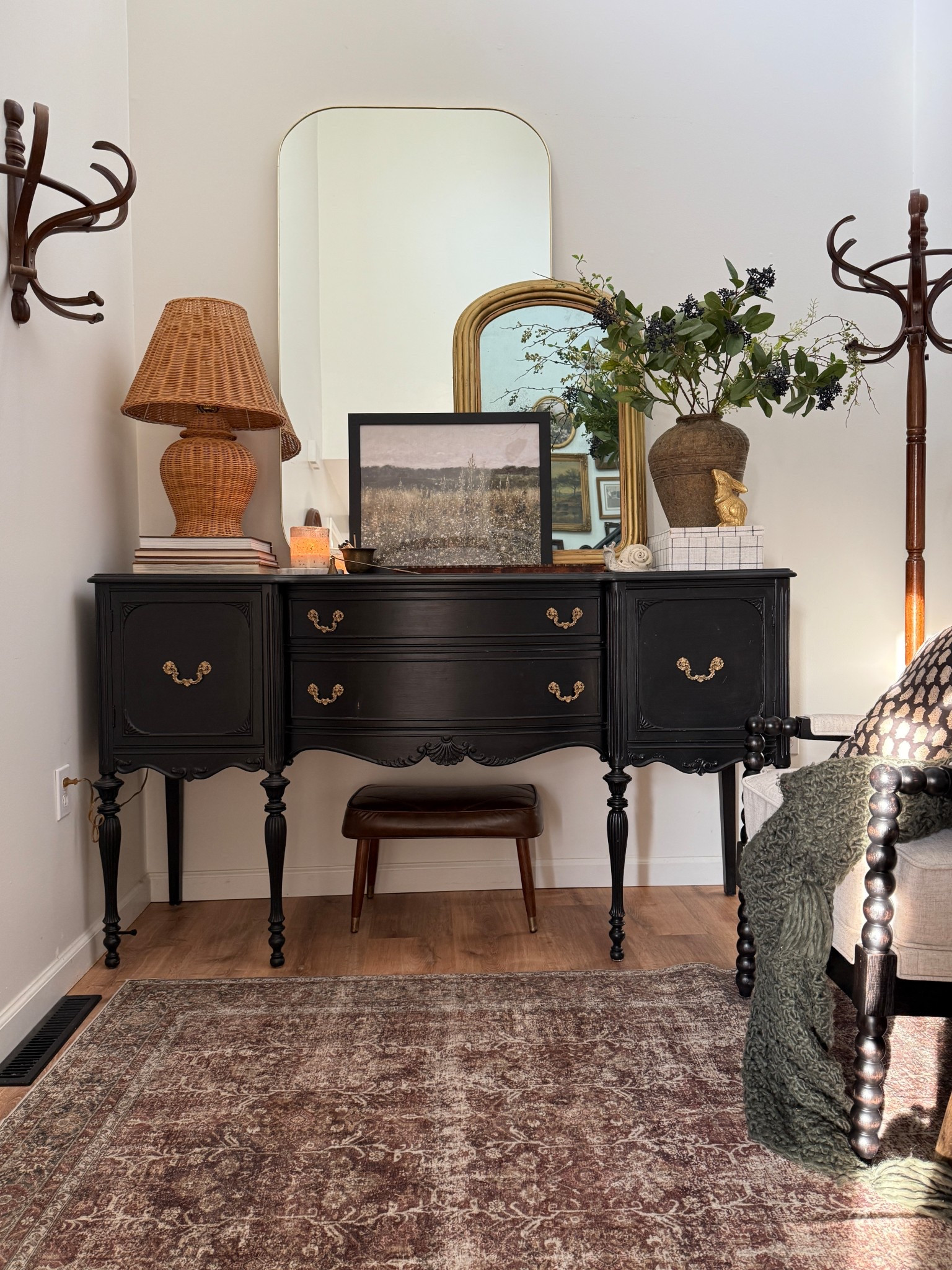 Entryway charm! Vintage coat racks, a great rug, good art, and candles are all a must! 

#LTKHome #LTKSeasonal
