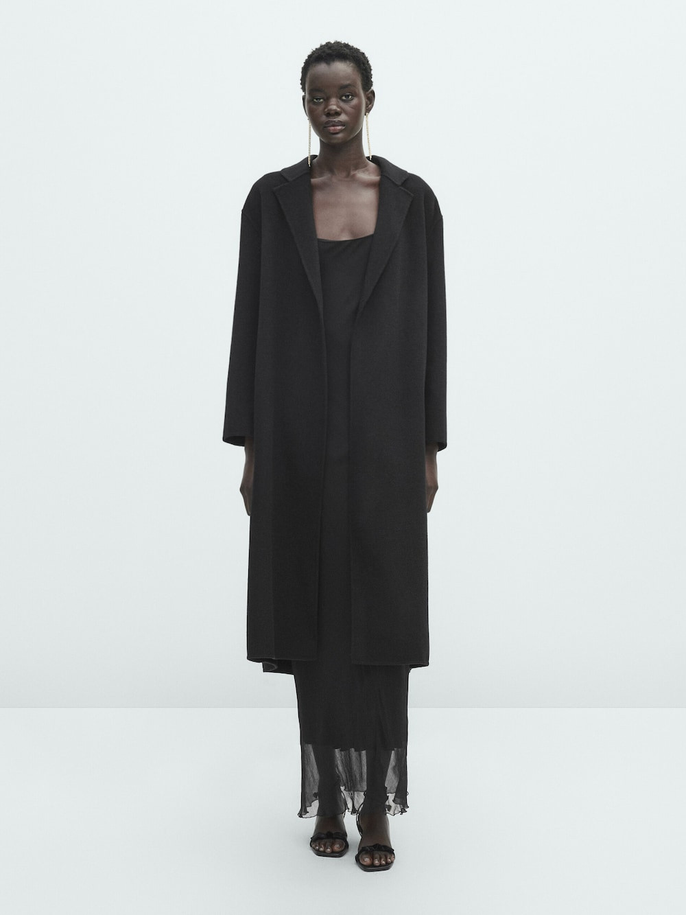Long wool blend coat with strap at the back | Massimo Dutti UK