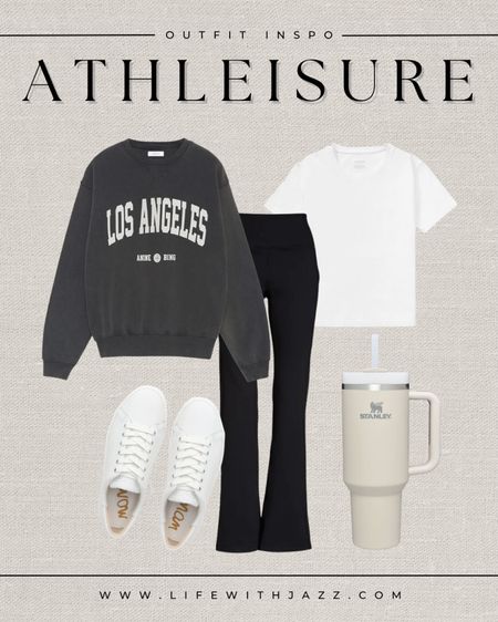 Comfy athelisure / weekend inspo outfit 🖤 

Graphic sweatshirt  / white tee / flare leggings / white sneakers / Stanley mug / comfy / weekend / running errands 

#LTKstyletip