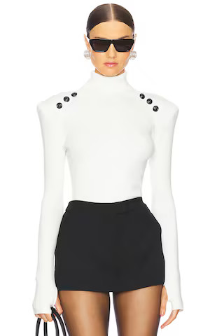 L'AGENCE Reeves Button Detail Turtleneck Sweater in Ivory & Black from Revolve.com | Revolve Clothing (Global)