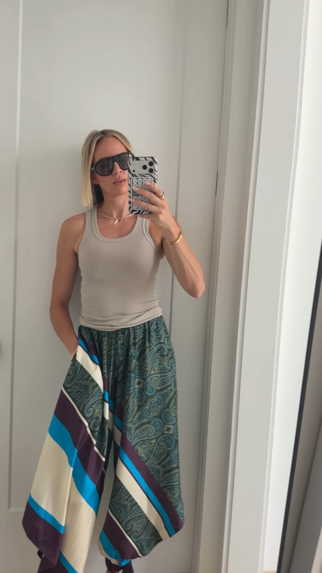 I’m wearing the wrong bra with this outfit. Look past that.😬 wearing a small in the tank in a small and the pants. Every time I wear these pants, I get compliments from people. Like multiple times a day. and theyre insanely comfortable ￼￼

#LTKootd #LTKOver40 #LTKTall