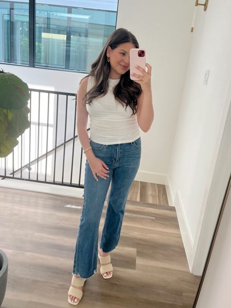 You can never go wrong with denim and a white top. This one has ruching on the sides which I like being postpartum 🤍

White mock neck. White tank top. Cropped denim. Just black denim. High rise jeans. Braided sandals. Summer sandals. Summer outfit. Gold jewelry. 

#LTKfindsunder100 #LTKstyletip