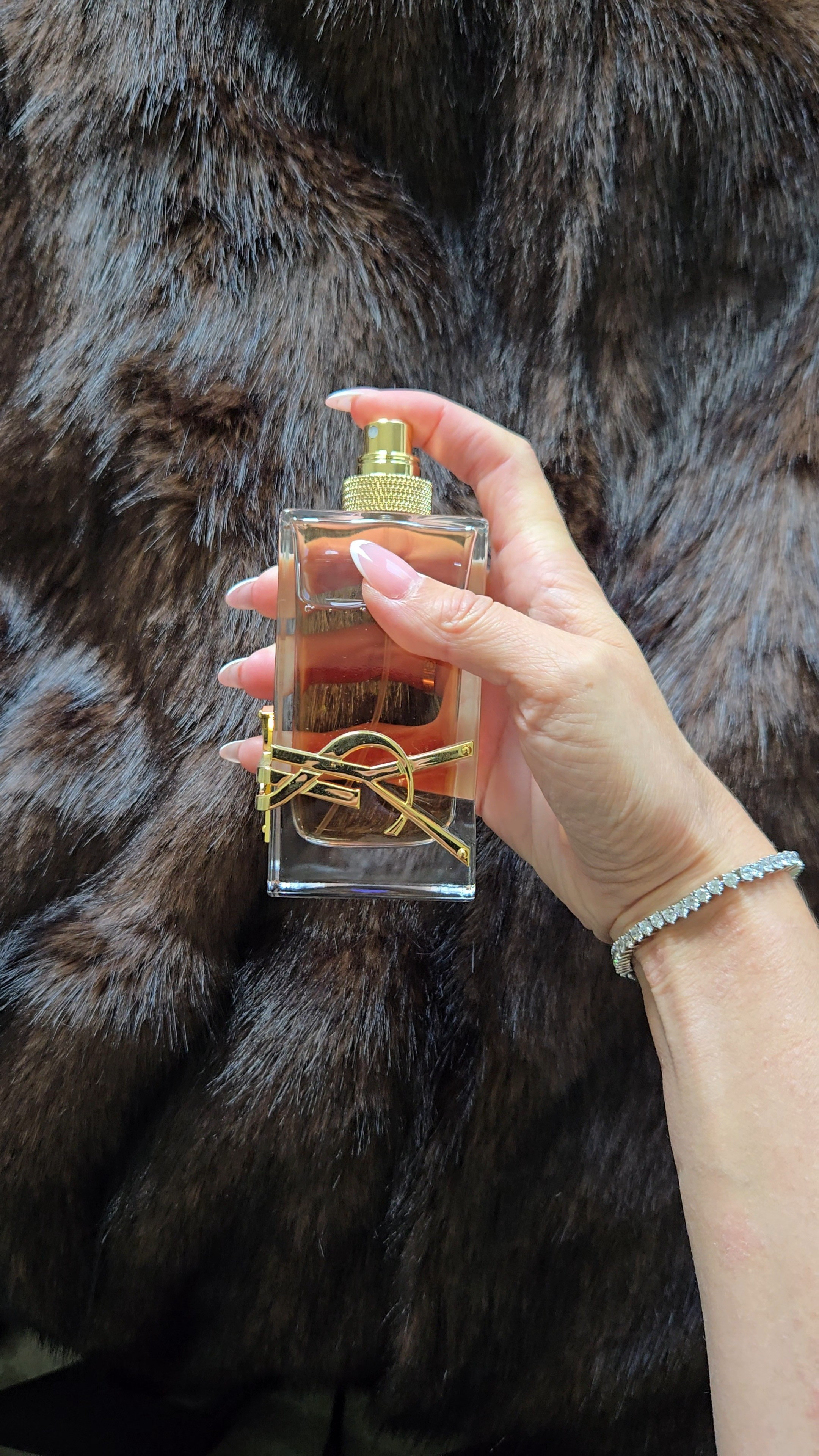 Saint Laurent Libre at TJ Maxx! Brown fur coat, tennis bracelet.

#LTKSaleAlert #LTKBeauty #LTKFindsUnder100