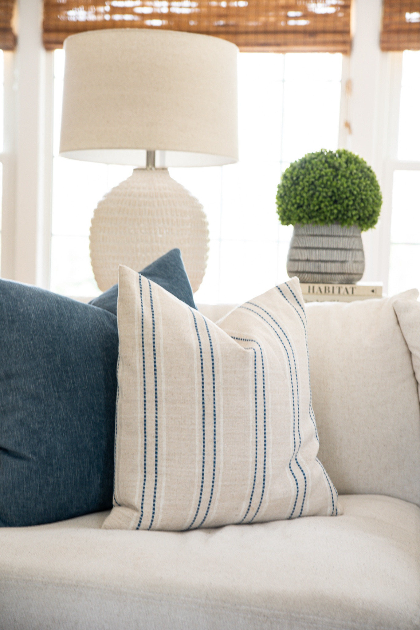 Throw pillows are the best way to add color to a space. Mixing a solid with a pattern is my favorite way to do it!

#LTKHome #LTKStyleTip #LTKFindsUnder50