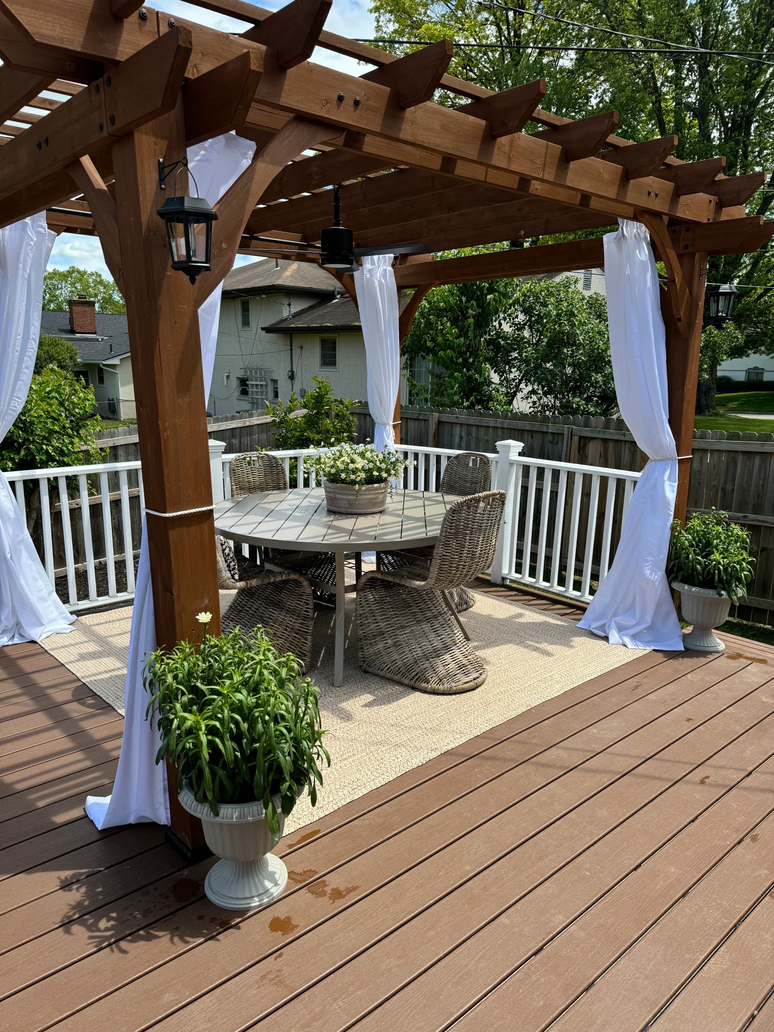 Deck dining space 

Outdoor - seating - waterproof - patio - furniture - table - chairs - rug - faux flowers - curtains - pergola 

#LTKHome #LTKSeasonal #LTKSummerEdit
