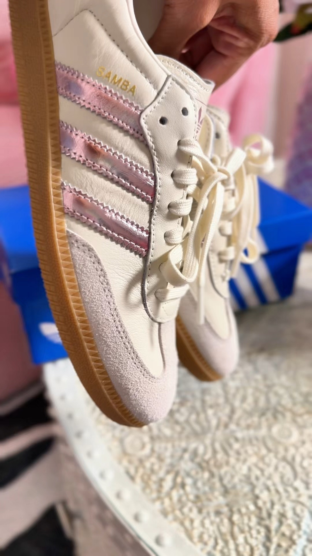 For the adidas Samba OG in cream with soft pink stripes, I’d go a little more fashion/lifestyle since this is a shoppable post:

I didn’t need another pair of Sambas… until I saw THIS colorway. 🎀👟 The cream, blush pink stripes, and gum sole are such a pretty combination without being too pink. They’re neutral enough to wear with almost everything, but still have that little pop of color that makes the outfit.

These are going straight into my travel-day + everyday sneaker rotation. ✈️💕

#AdidasSambaOG #AdidasSamba #PinkSneakers #SneakerStyle #EverydayStyle