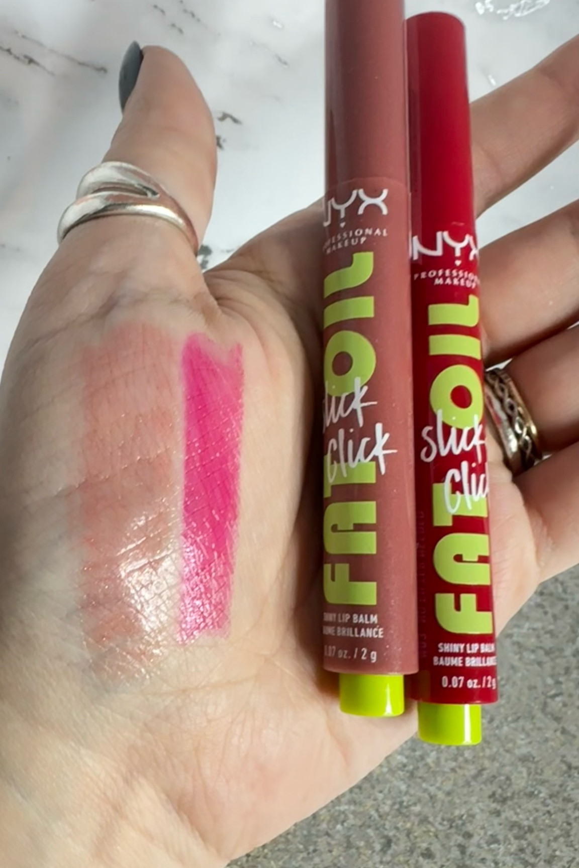 Want a pigmented Lip Balm?!… 
💋 N.y.x Fat Oil Slick Click Lip Balm’s are absolutely amazing!! 
In shades 
   -  No filter needed 
- Double tap
They have a thick lipstick consistency but in a balm like container. I love these. Can’t wait to try more shades!! So pigmented. Which shades have you tried? Let me know in the comments!!

Tags- 
#lipbalms #nyxcosmetics #fatoilslickclicks #liplook #bestlipbalms #lippies #makeup 

#LTKfindsunder50 #LTKsalealert #LTKbeauty