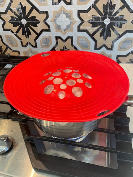 This is the spill stopper lid that I use to prevent pots from boiling over. The red one that I have is no longer available but I’m linking a purple one in the same style  

#LTKfamily #LTKFind #LTKhome