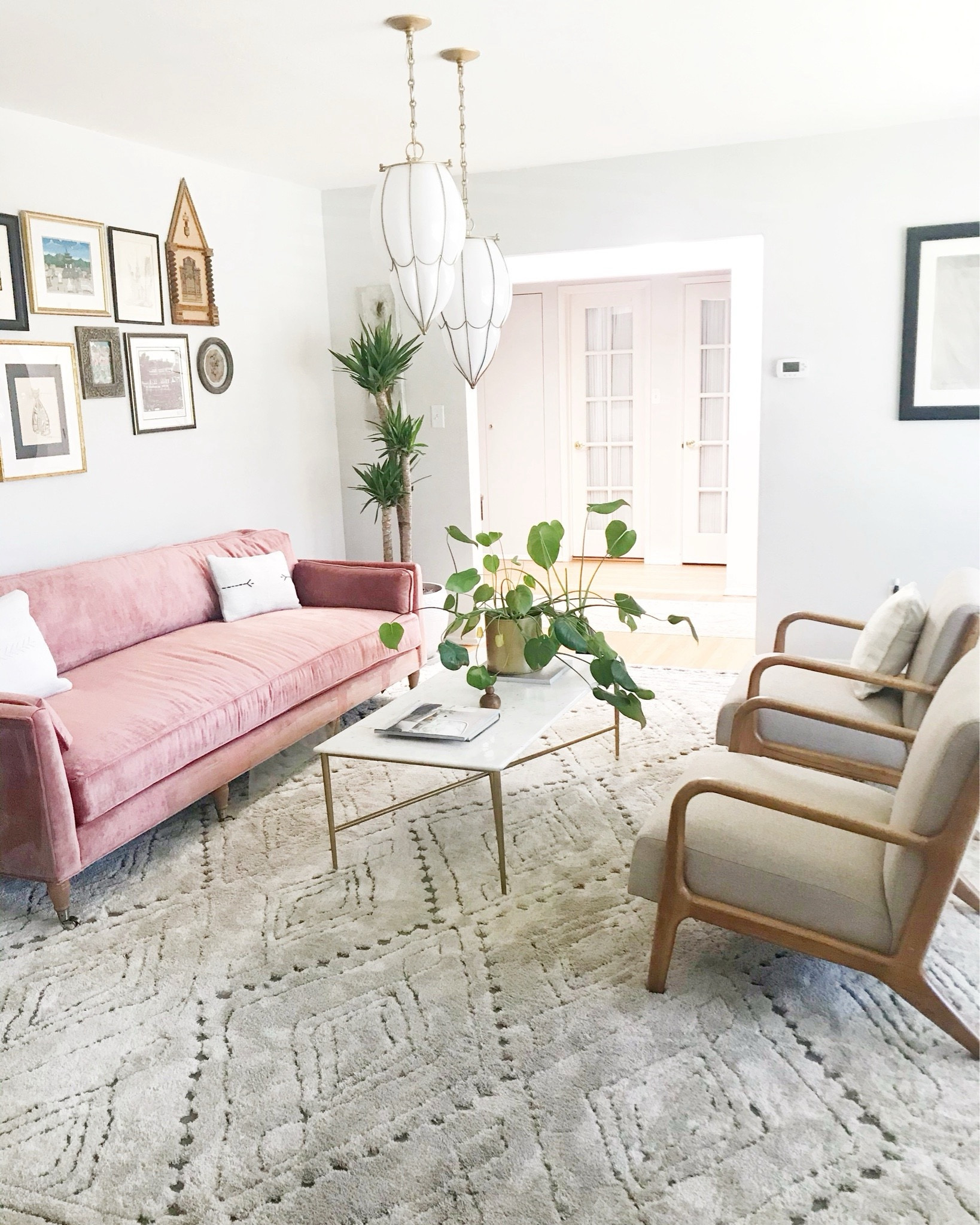 Swipe 👉 to see the before of this living room makeover.  The gallery wall didn’t change, but we upgraded the couch, rug, coffee table and occasional chair to give it a whole new look!  

#LTKHome