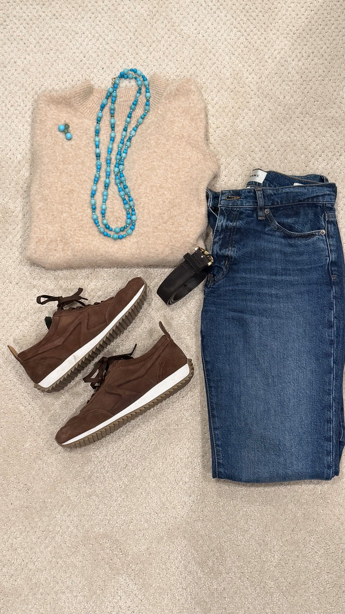 Simple pieces that always work together.

A soft neutral knit, great-fitting denim, and brown sneakers make the base of this look. I added a suede belt and a turquoise necklace for a little contrast and personality.

This is exactly how I think about building outfits from a signature wardrobe. Start with timeless staples, then layer in one or two pieces that make it feel like you.

Everything linked.

#LTKootd #LTKgrwm #LTKPetite