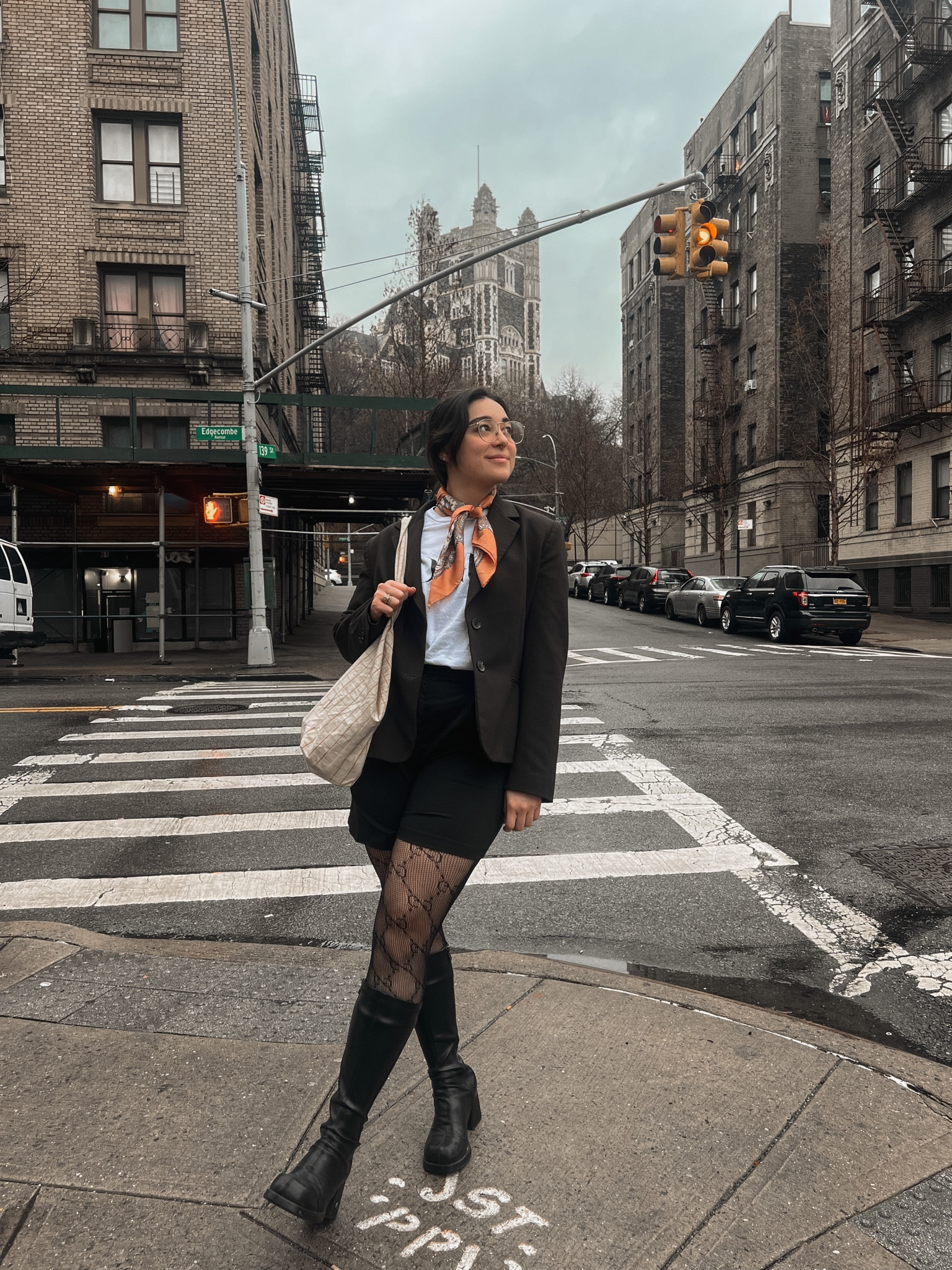 Spring transition outfit with black boots and tights