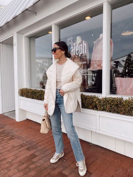 Winter outfit 
Oversized white liner jacket (runs tts) 
Heathered ribbed top 
90’s jeans (tts) 

#LTKstyletip #LTKSeasonal