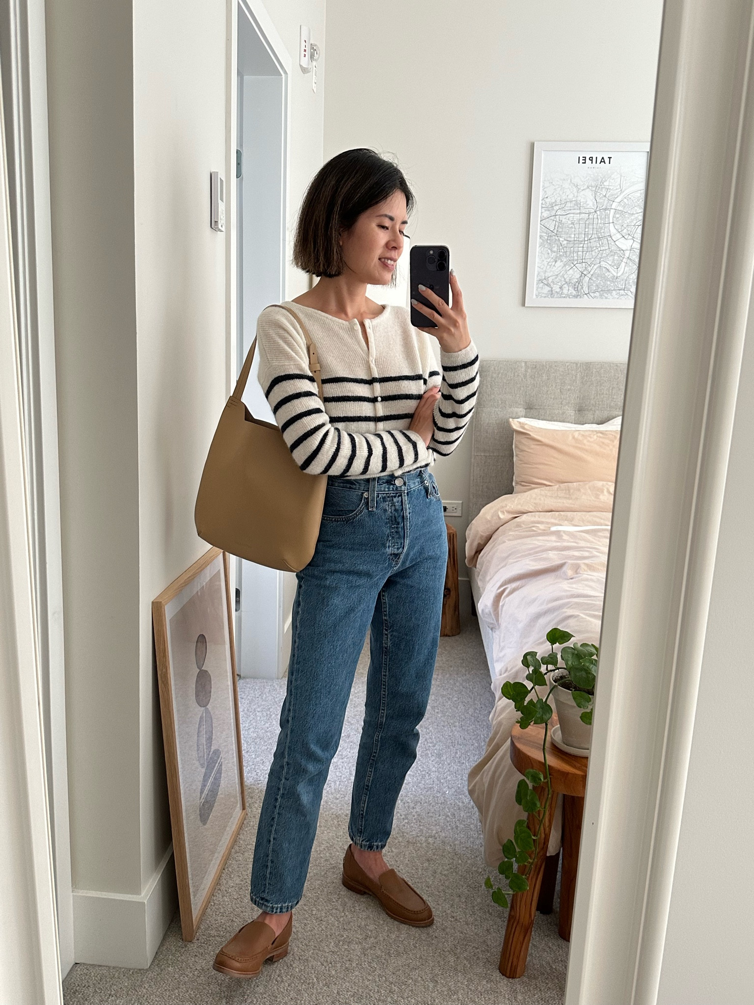Sweater: Sezane Gaspard Cardigan. Runs large. I’m in xs, my regular size and it’s roomy 
Jeans: ON SALE Everlane tts
Shoes: ON SALE Everlane tts
Bag: ON SALE Everlane Cactus hobo

#LTKCyberWeek