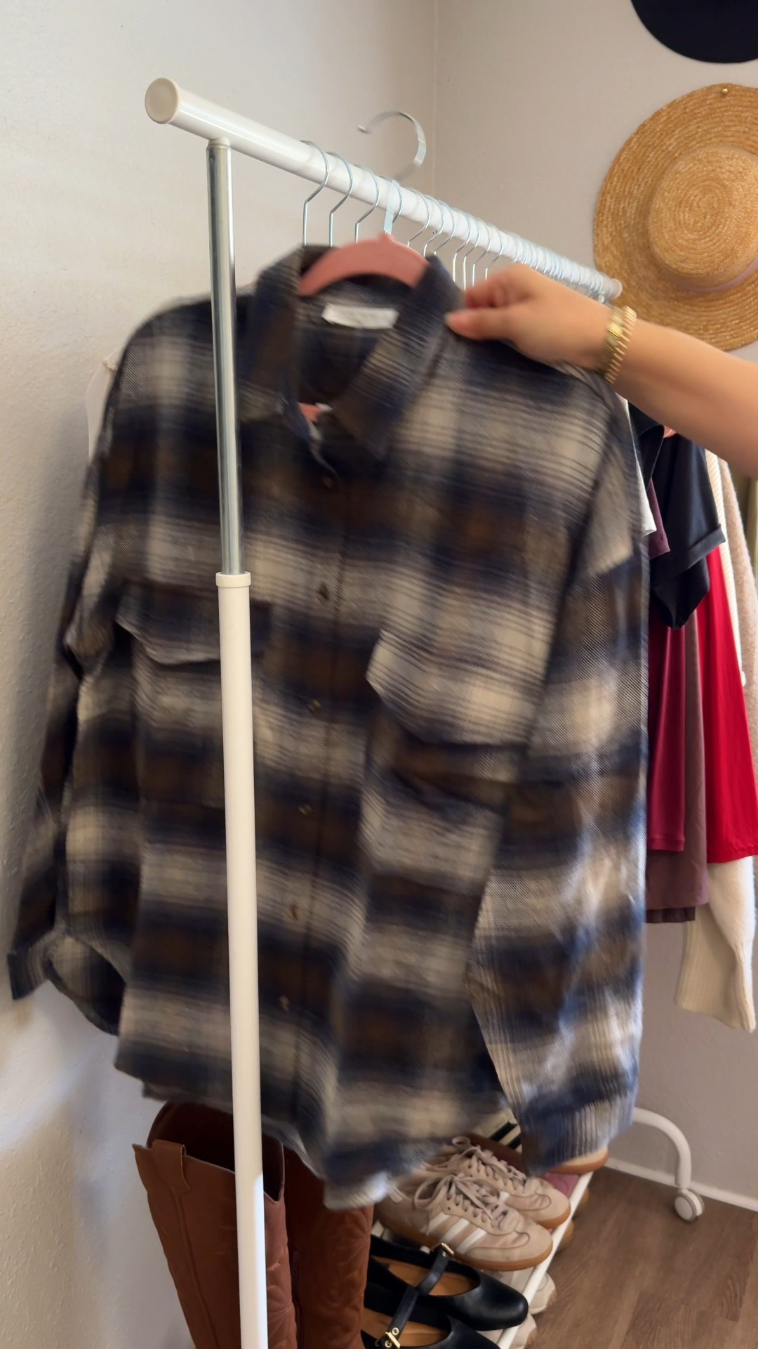 Everyday casual outfit featuring a plaid button down styled as a waist tie with a black tank, wide leg jeans, and sneakers. This is one of my go to casual outfits for running errands, coffee dates, and easy off duty days. A great everyday outfit idea if you love effortless, wearable looks and closet staples.

Tank // M
Jeans // 10
Plaid Shirt // OS
Sneakers // 8

#LTKOver40 #LTKgrwm #LTKootd