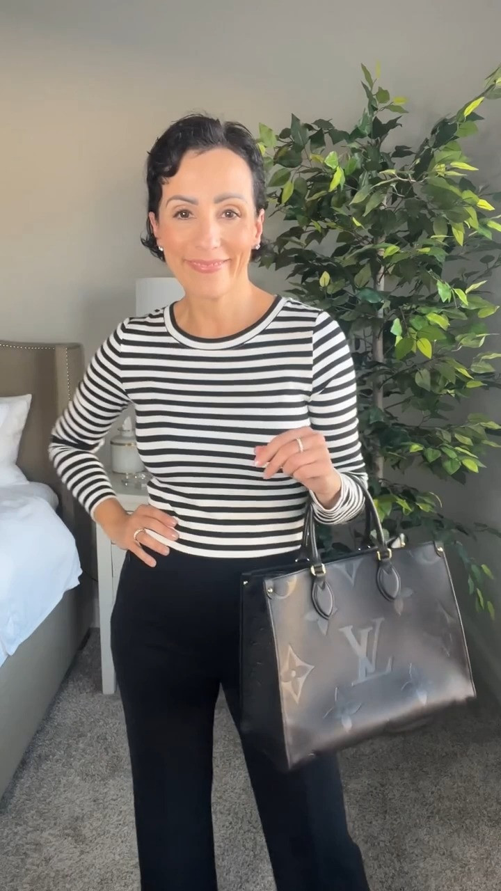 Stripes and smiles! 😊 Keeping it classic and chic with this striped long sleeve tee from LOFT. It’s one of those effortless pieces that never goes out of style and pairs perfectly with my favorite black trousers. Add a statement bag, and I’m ready to take on the day with confidence! 

 #LTKVideo #LTKFindsUnder50 #LTKStyleTip