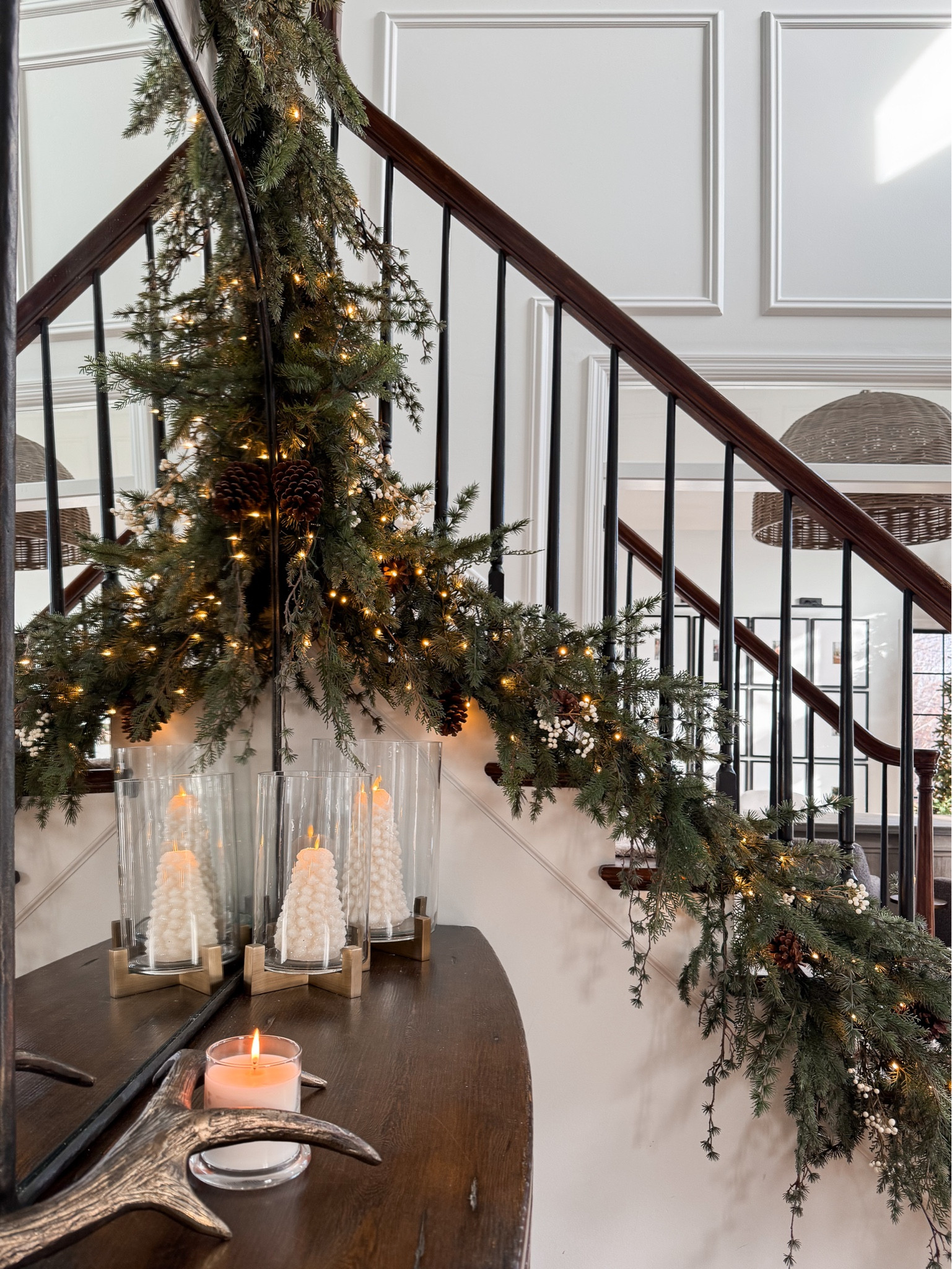 Elevated entry way holiday decor. I love the garland on the lower part of our staircase this year! 

#LTKStyleTip #LTKHome #LTKHoliday