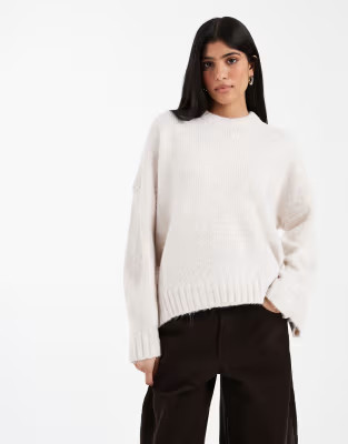 ASOS DESIGN oversized crew neck sweater with curved hem in cream | ASOS | ASOS (Global)