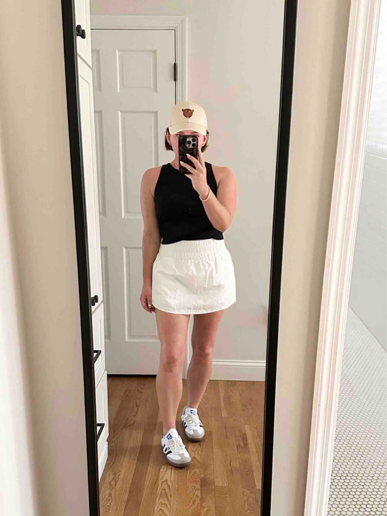 White Skort Black Tank Mom Outfit // wearing a medium in both the skort + the tank

#LTKActive #LTKFindsUnder50 #LTKSeasonal