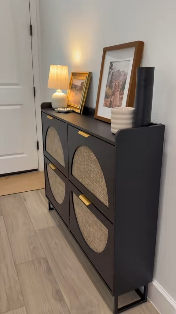 A gorgeous entry table that doubles as shoe storage = an organization dream 😍
decluttering and cleaning up is a huge goal of mine in the new year and this shoe cabinet makes it so easy because it's as functional as it is pretty. Such an affordable piece that makes our entry look so much nicer too!! 👟👠🥾👡🩴
#shoecabinet
#tiktokshopholidayhaul #entryway #ttshopfinds #vabchesreview
@Vabches.Us

#LTKHome #LTKmomlife