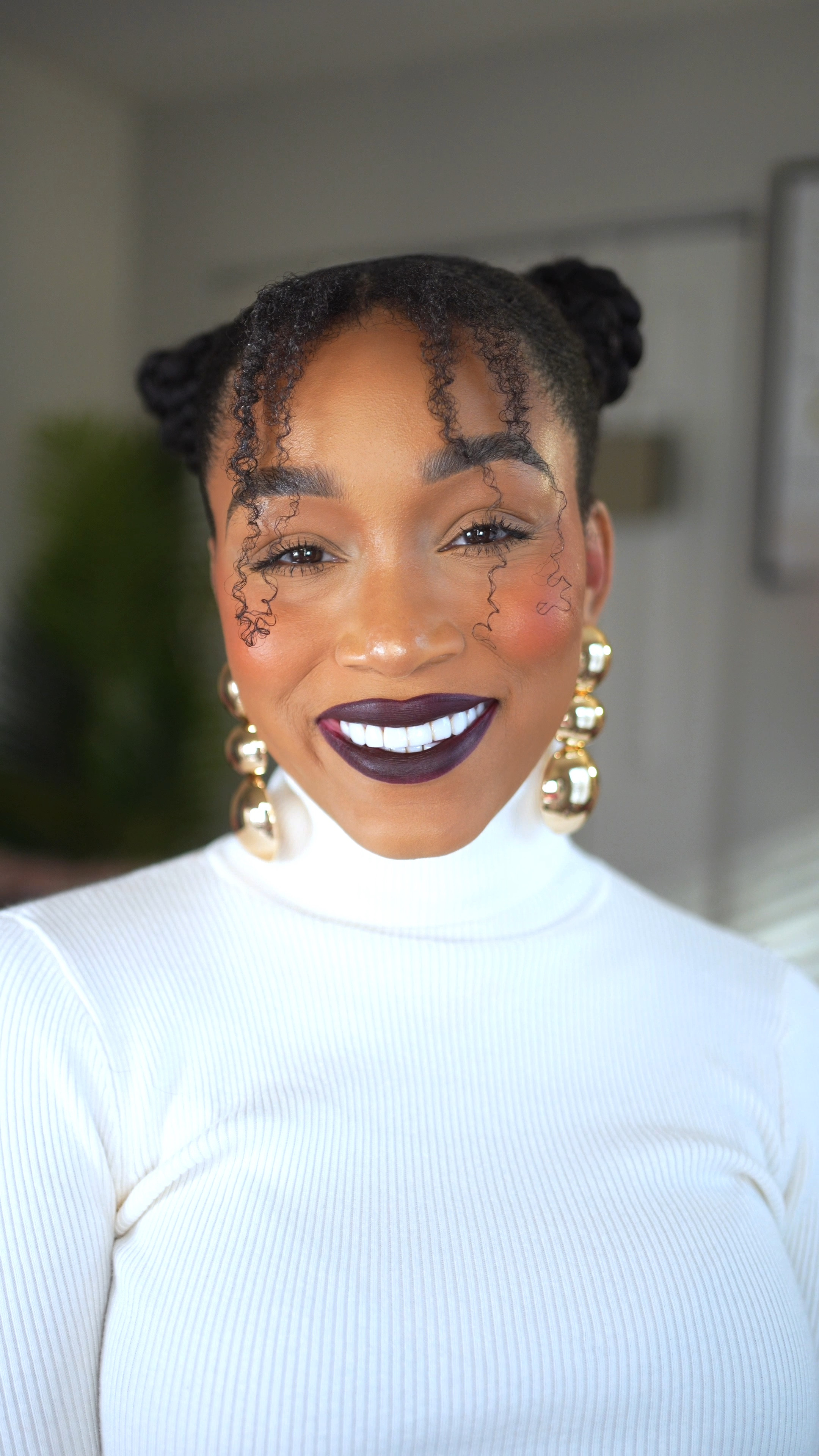 Braided space buns but make it ✨grown✨. This style is giving playful meets chic, and I’m obsessed! Two sleek braids feeding into space buns = an easy yet statement-making look. 💜 And y’all know I had to pair it with a bold lip and chunky earrings because…why not?!

If you need a cute, effortless hairstyle that turns heads, this is it. Tap to shop everything from the hair essentials to this fire purple lip! 💄✨ #NaturalHairstyles #BraidedSpaceBuns #ProtectiveStyles #BoldLip #StatementJewelry #LTKBeauty #NaturalHairCommunity #SleekStyles #HairInspo