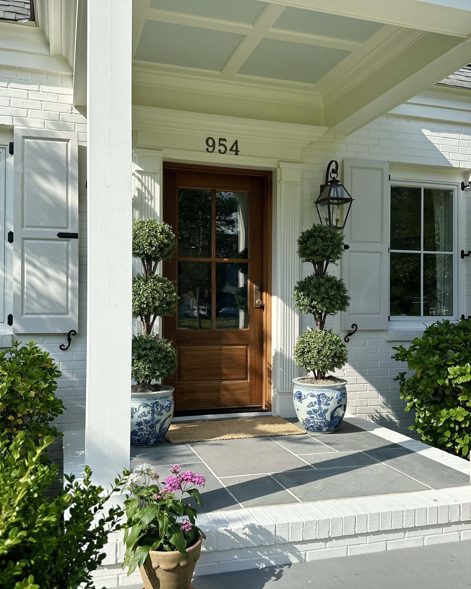 The most popular item this year!! Captured during my exclusive home tour with Molly Basile in Charleston, SC. These blue king hand-painted ceramic planters add instant curb-appeal and have been part of Molly’s front porch decor for years. Also, linking the faux topiaries which I also have on my front porch and come as a set of 2

#LTKSaleAlert #LTKMostLoved #LTKHome
