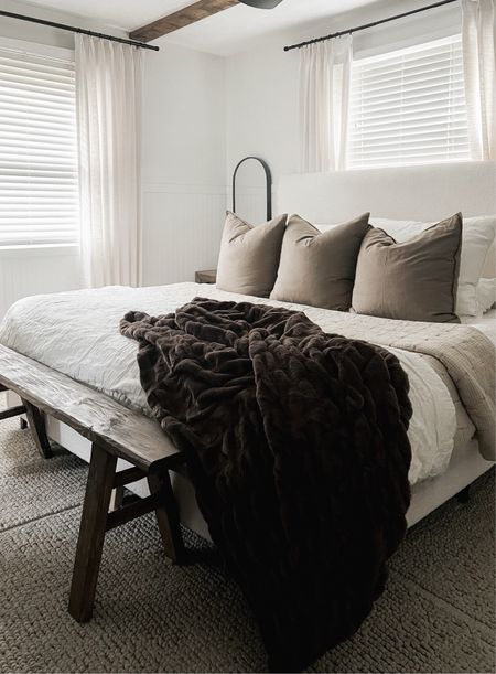 neutral primary bedroom refresh - added beadboard + beams. bright + airy with warm browns in textiles 

Linen bedding. Bedroom. Boucle bed. Wood bench. Elm wood bench. Fur throw blanket. Brown bedding. Taupe quilt. Quilt. Neutral bedding. 

#LTKfindsunder50 #LTKhome #LTKstyletip