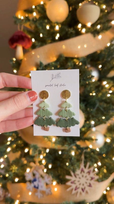  GAL PAL GIFT: precious handmade jewelry from Etsy! These funky little Christmas trees were made by ‘Painted Leaf Studio’ and am obsessed with how cute they are. 

Love the delicate gold hardware too. 🎄

#Holiday #jewelry  #Christmas #Evergreen #ChristmasTreeEarrings  #ChristmasJewelry #HolidayEarrings #Earrings #Etsy #ChristmasTrees

#LTKSeasonal #LTKGiftGuide #LTKHoliday