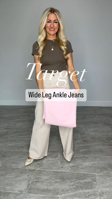 Target wide leg ankle jeans. Jeans are fitted in the waist and high rise. Relaxed fit through the hips. If you are petite (I’m 5’1) the jeans will be full length. They come in 7 color options. They are versatile to wear casually, business casual or going to dinner. Wearing shades cream, pink and white 

#LTKfindsunder50 #LTKstyletip
